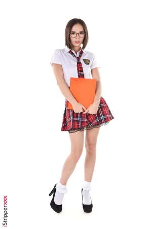 Schoolgirl Eve Sweet sticks a stainless steel butt plug in her asshole - 1
