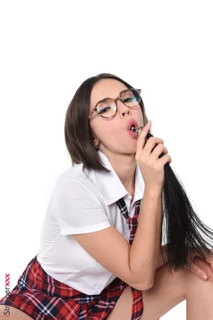 Schoolgirl Eve Sweet sticks a stainless steel butt plug in her asshole - 7