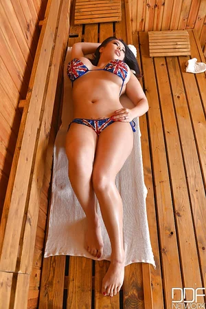 Buxomy Asian model Tigerr Benson strutting non bare in swimsuit - 1